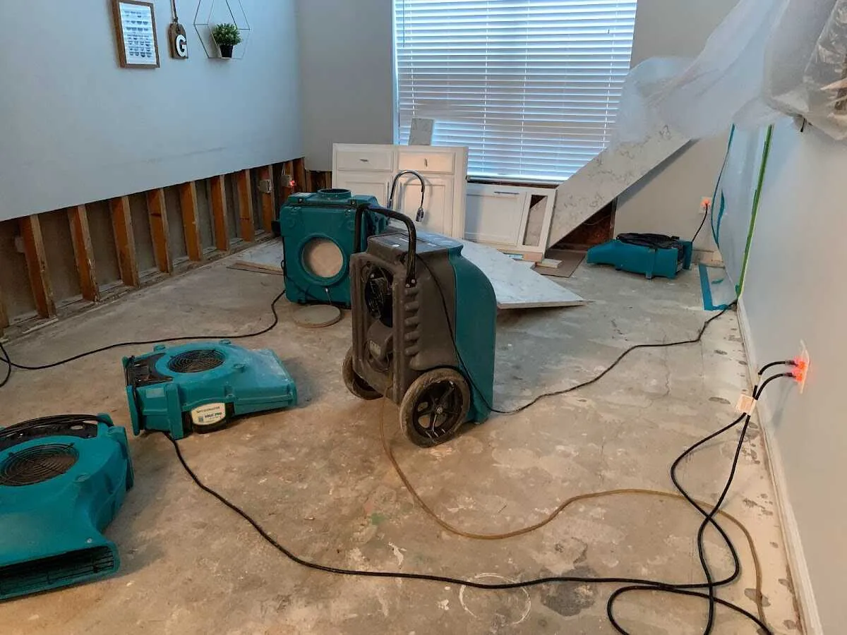 Dehumidifier in flood-cut room for Water Damage Restoration in Eustis